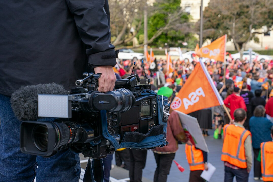 news reporters covering event